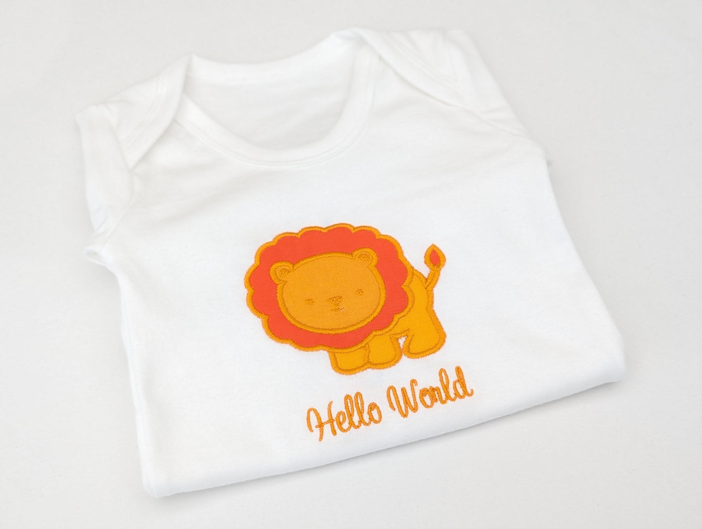 Hello World Embroidered Baby Lion Top